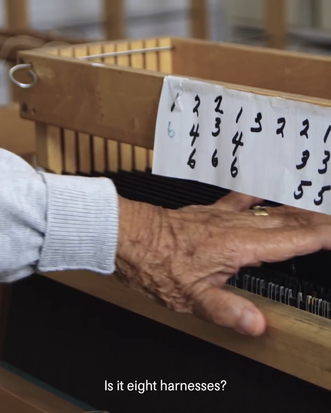 Weaver Kay Sekimachi at her loom